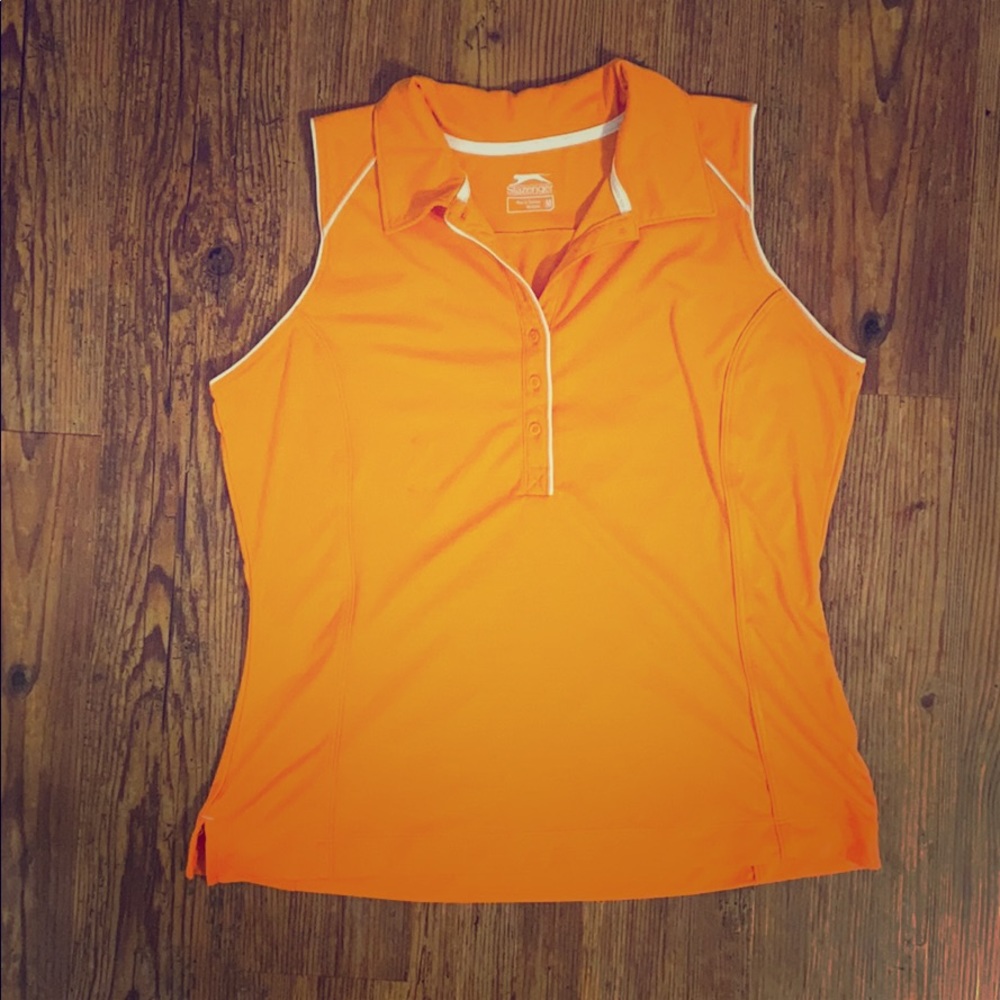 Orange sleeveless golf polo, size medium.